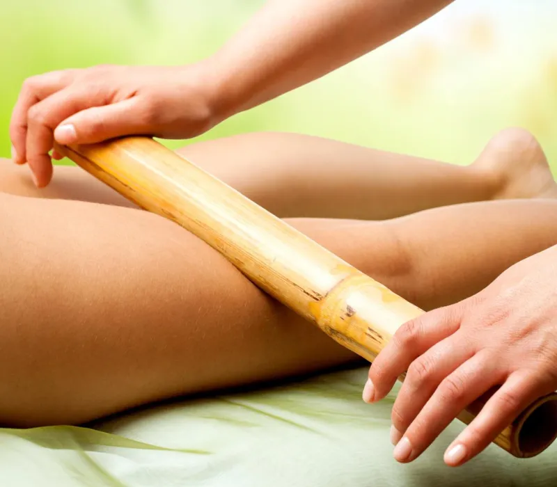 Bamboo Sticks Massage in Huddersfield — warmed bamboo sticks to ease muscular tension and promote deep relaxation.